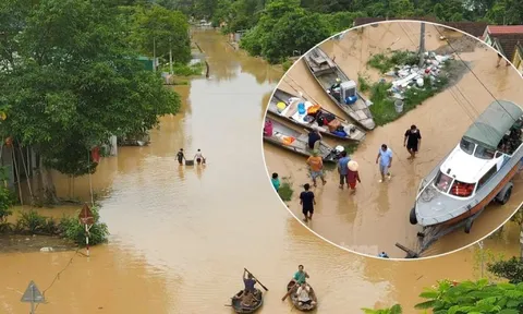 Lũ trên sông Lam dâng cao, quốc lộ hóa sông, người dân chèo thuyền sơ tán tài sản