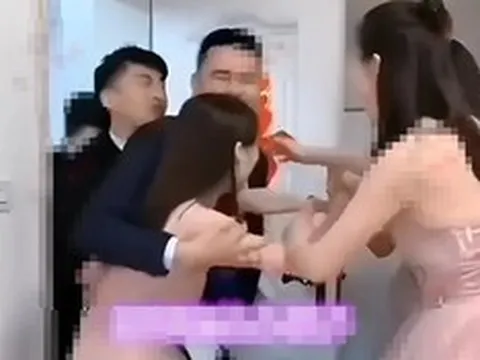 Chú rể ôm nhầm "gái lạ", cô dâu có phản ứng gây xôn xao